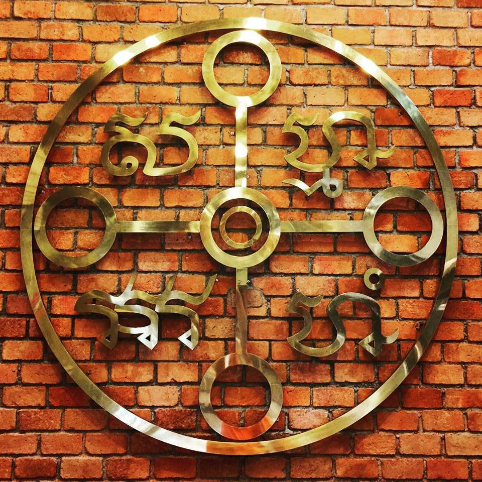 The Samma Arahang mantra for meditation as illustrated in a big talisman in ancient Khmer alphabets