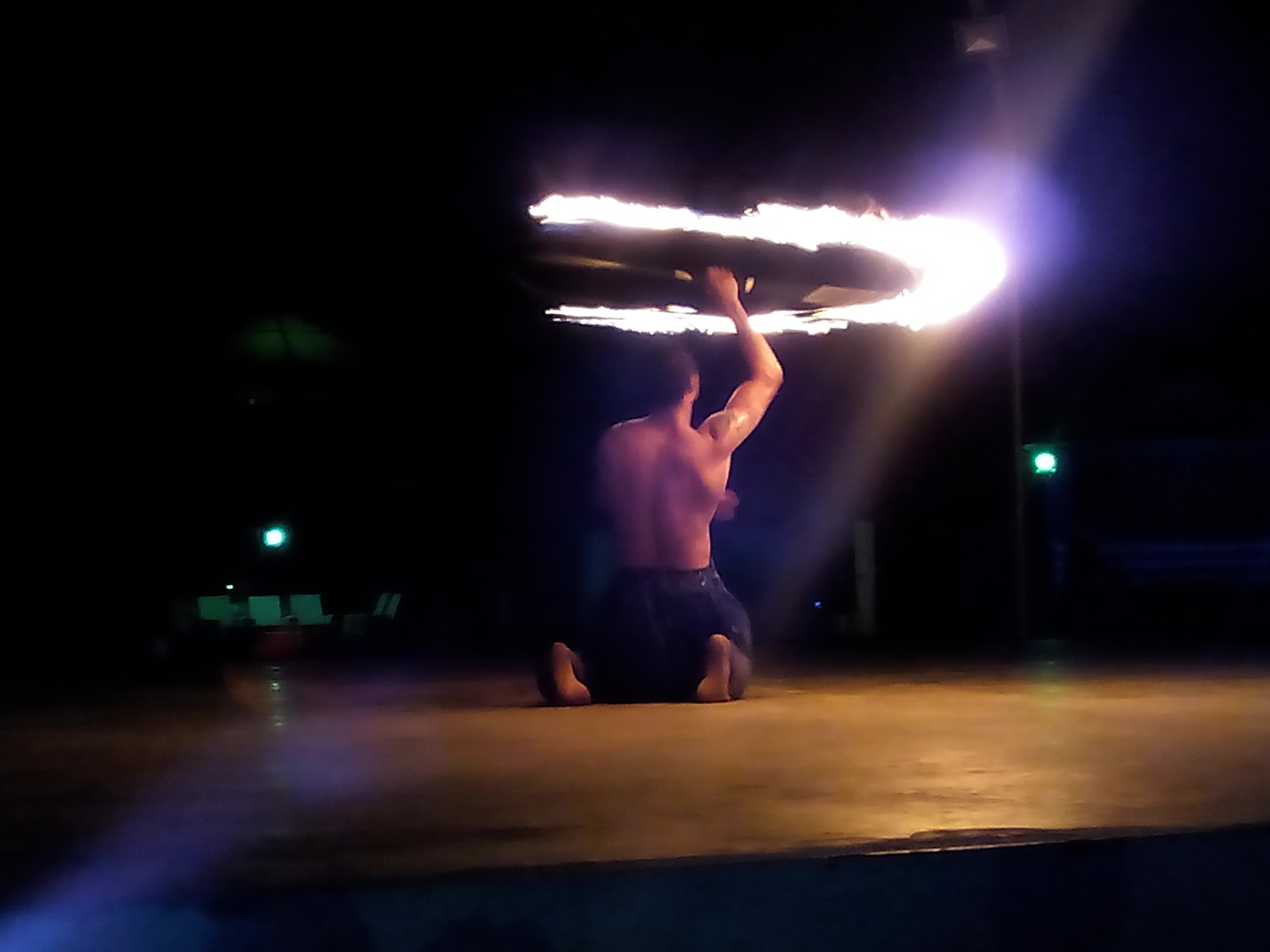 A Fire Dancer: Without being connected to his deeper calmer self, a fire dancer cannot perform such awe-inspiring feats.