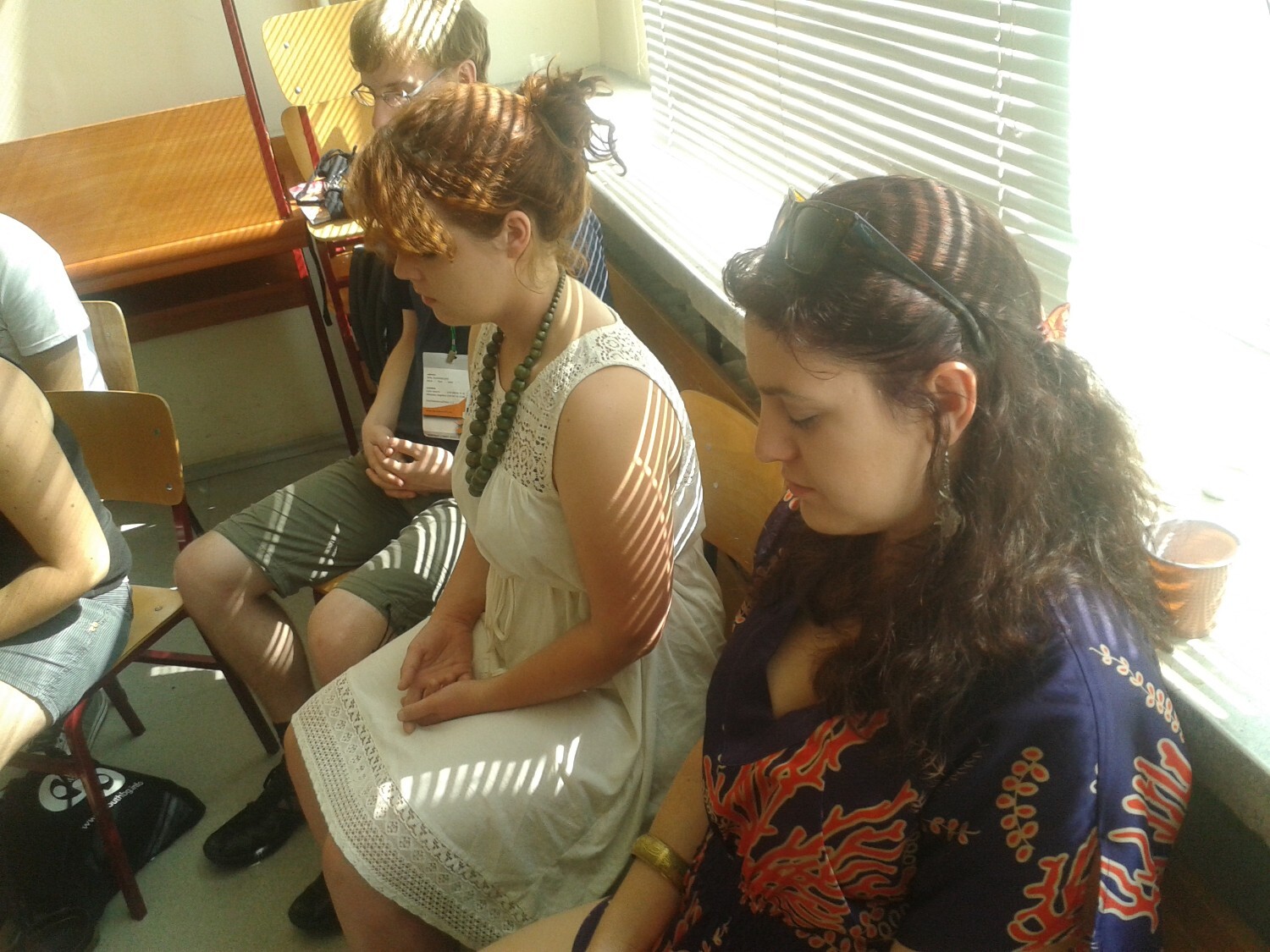 Participants of the Leadership Summer School are meditating.