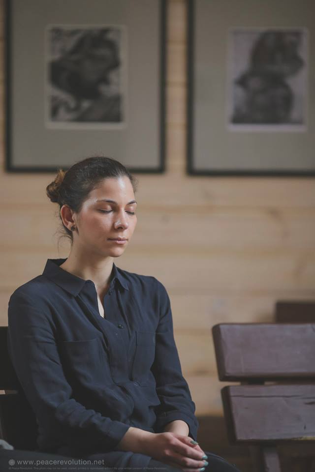 A calm woman meditating