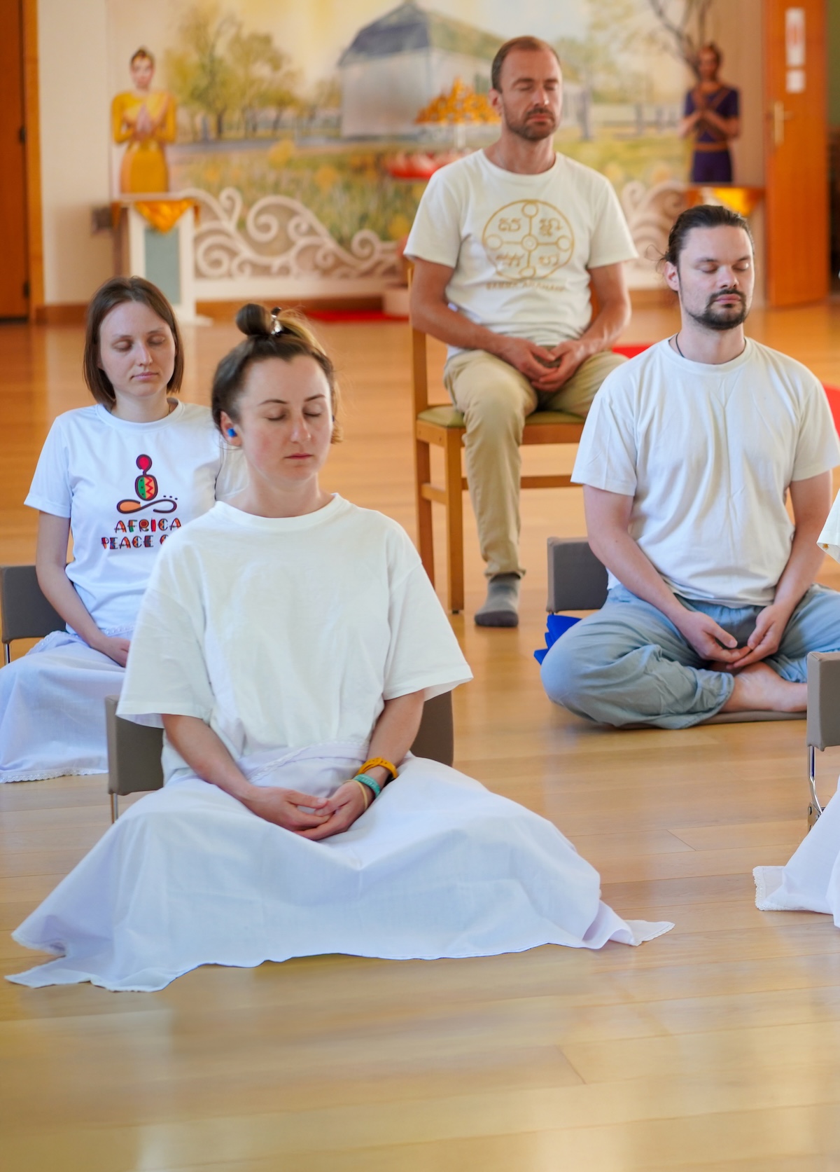 Meditation practitioners in hall