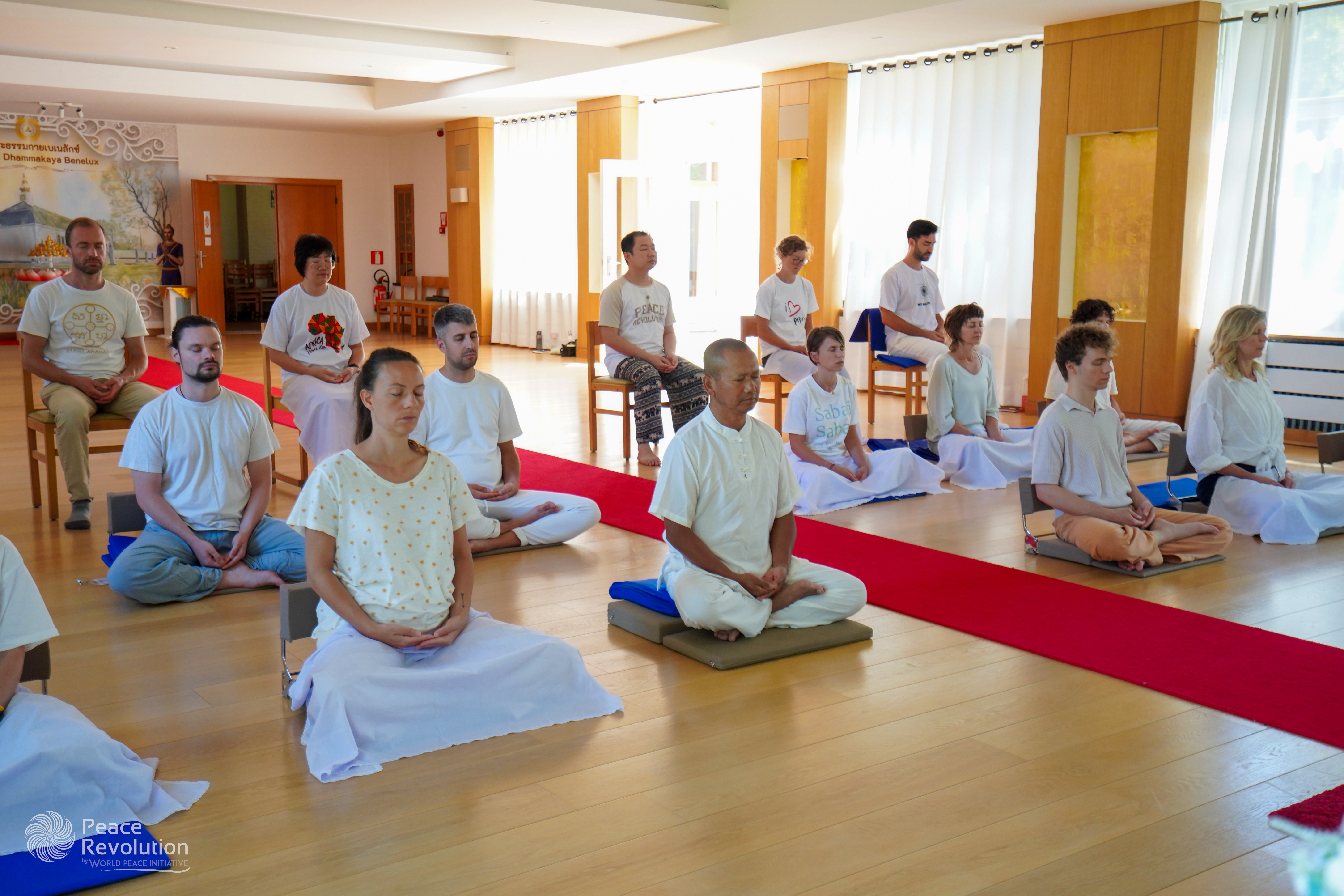 Meditation practitioners in hall